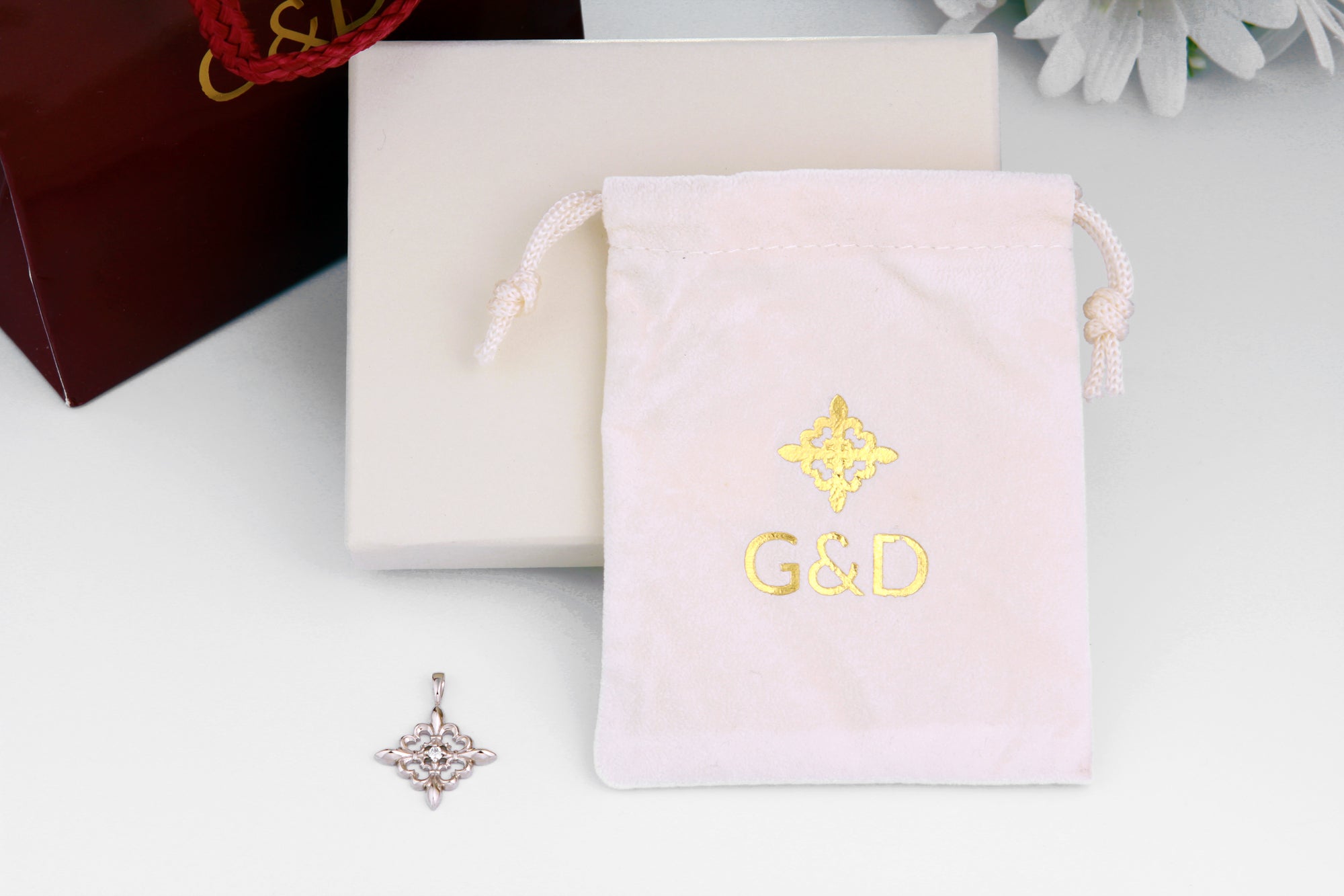 Fleur-de-lis Pendant with Blue Sapphire