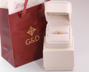 gold infinity ring in packaging of G&D Unique designs