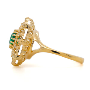 Profile view of the Diamond Lace Emerald Ring in 18K yellow gold, highlighting sculpted under-gallery, elevated emerald setting, and lace-inspired design by Gregory Simonov.