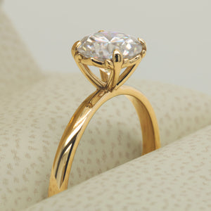 1ct moissanite engagement ring in yellow gold