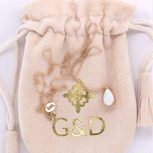 G&D Unique Designs velvet pouch with opal drop necklace