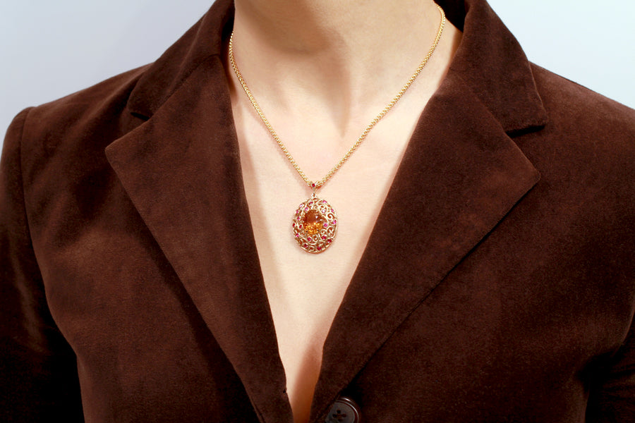Gold statement pendant with madeira citrine and rubies