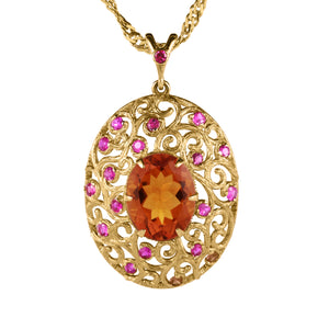Gold statement pendant with madeira citrine and rubies