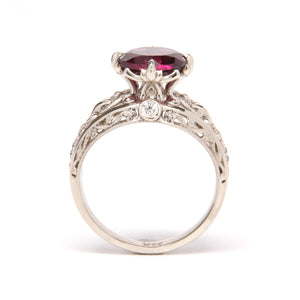 Gold Engagement ring with diamonds and Garnet in vintage style with floral design