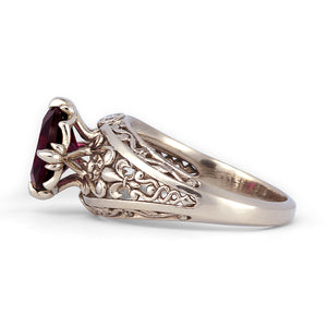 white gold vintage engagement ring with garnet diamonds